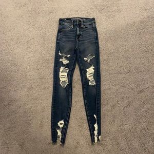 AE Dark wash super distressed high rise skinny jeans